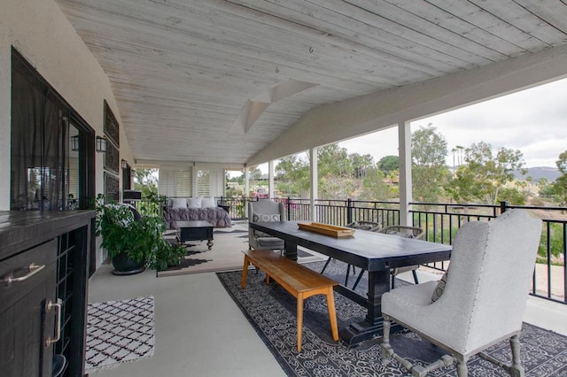 view of patio with an outdoor hangout area and outdoor dining space