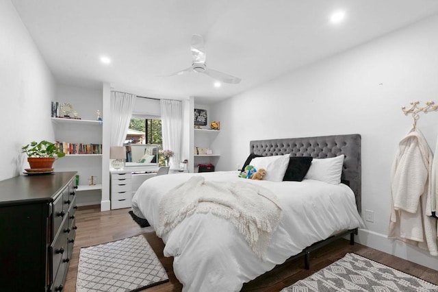 bedroom featuring recessed lighting, wood finished floors, and ceiling fan