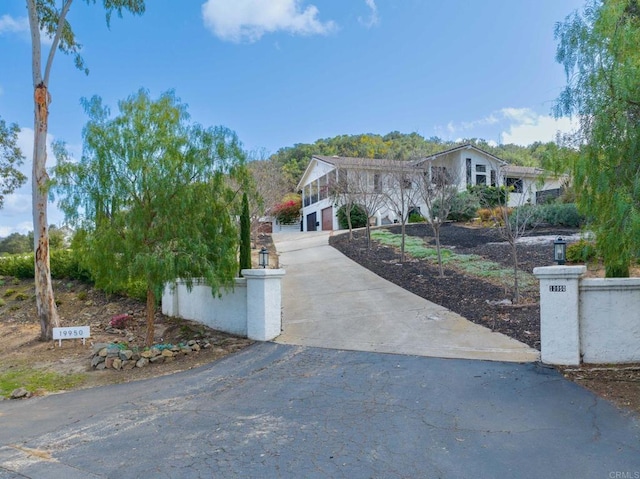view of front of house featuring aphalt driveway