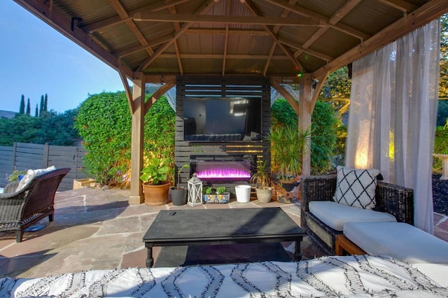 view of patio / terrace with a gazebo and fence