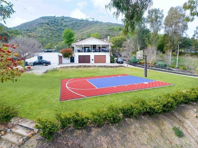 19950 Elfin Forest Ln, Escondido, CA 92029 - view of basketball court with basketball hoop, a mountain view, and a lawn