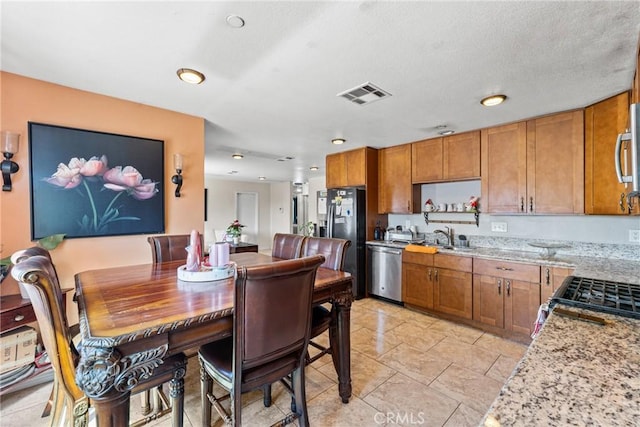 dining space featuring visible vents