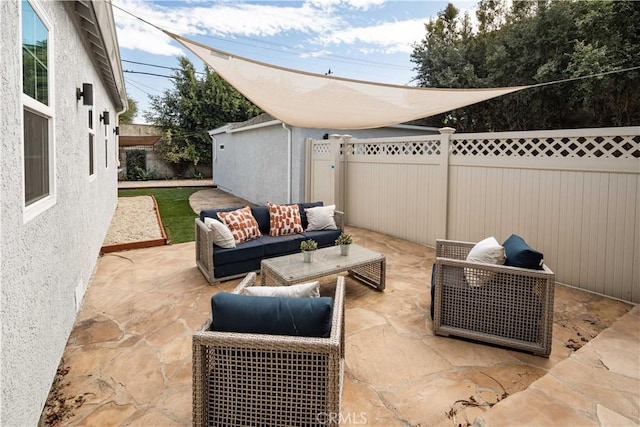 view of patio / terrace featuring a fenced backyard and outdoor lounge area