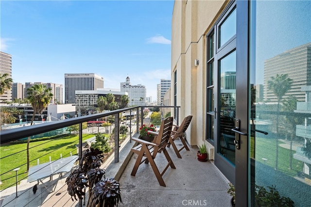 balcony featuring a view of city