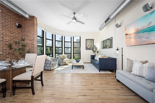 sunroom with a ceiling fan