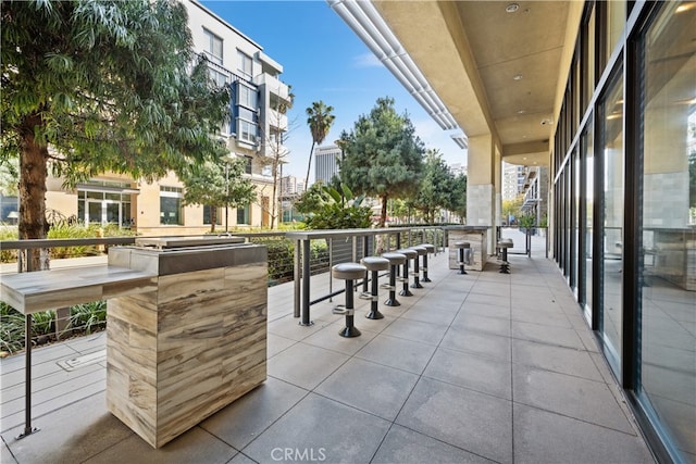 view of patio / terrace with a balcony