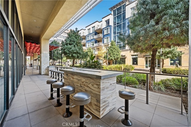 exterior space featuring outdoor dry bar