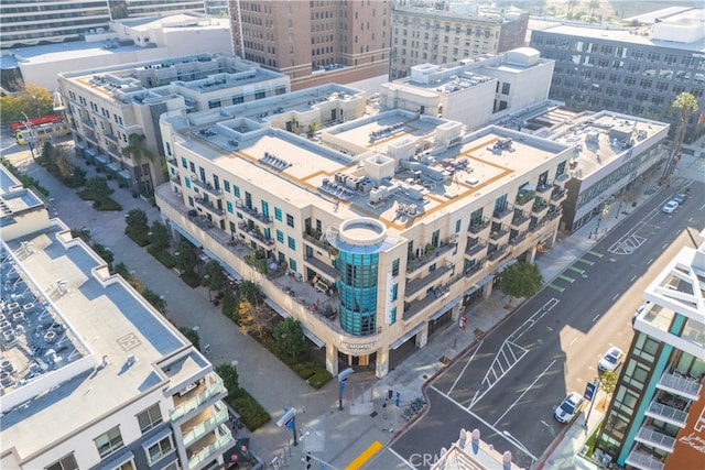 birds eye view of property with a view of city