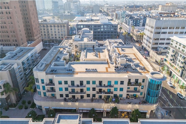 birds eye view of property with a view of city