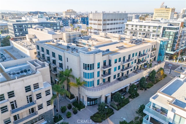 birds eye view of property featuring a city view