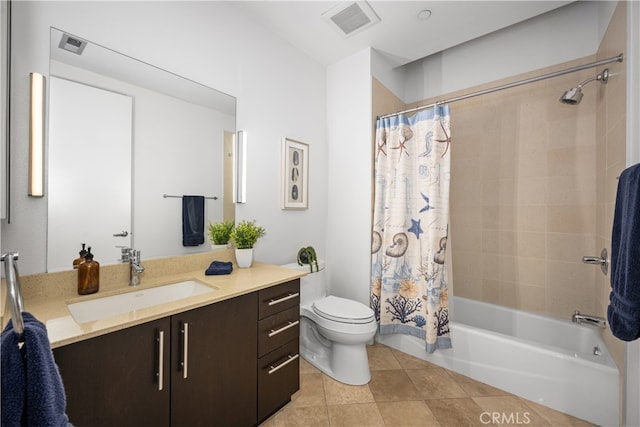 bathroom with shower / bath combination with curtain, visible vents, toilet, vanity, and tile patterned floors