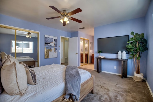 carpeted bedroom with a closet, visible vents, connected bathroom, ceiling fan, and baseboards