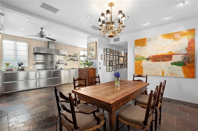 dining area with stone tile floors, visible vents, and recessed lighting