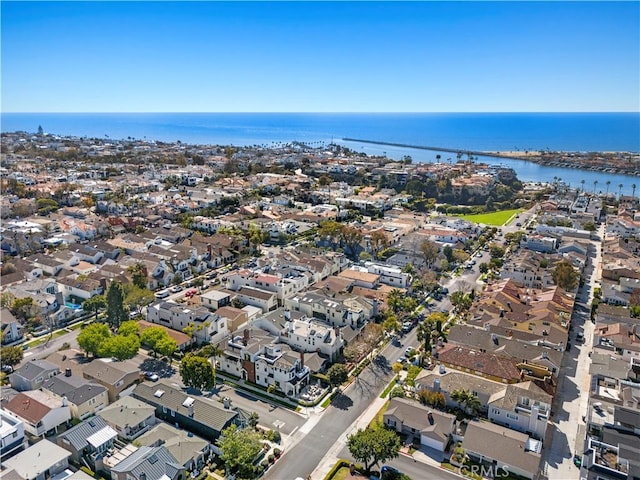 bird's eye view featuring a residential view and a water view