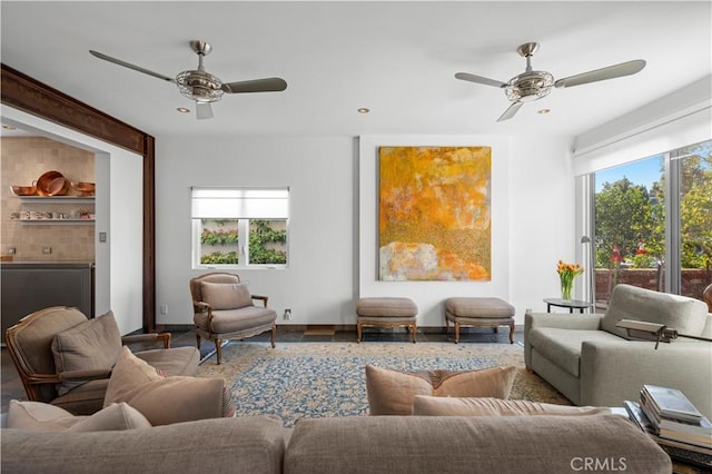 living room with ceiling fan