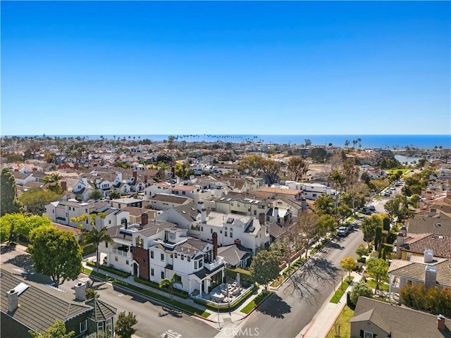 aerial view featuring a water view and a residential view