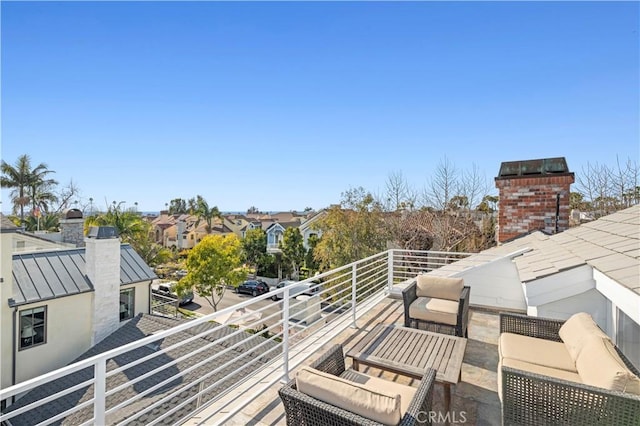 balcony featuring a residential view and an outdoor hangout area