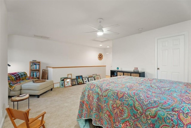 bedroom featuring carpet floors, visible vents, and ceiling fan