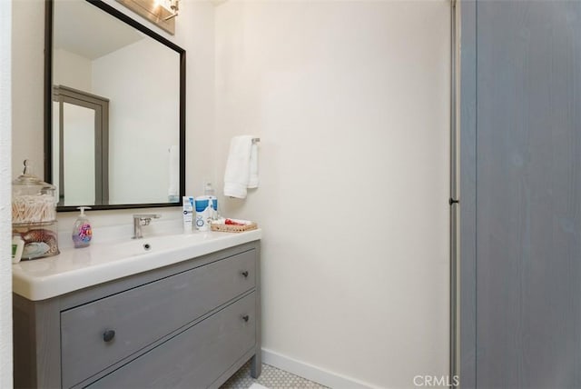 bathroom featuring vanity and baseboards