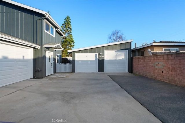 garage featuring fence