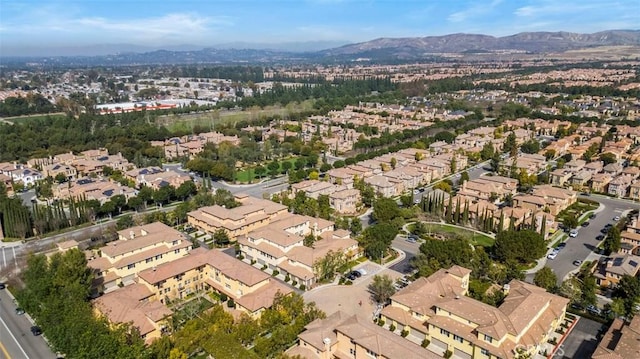 aerial view with a mountain view and a residential view