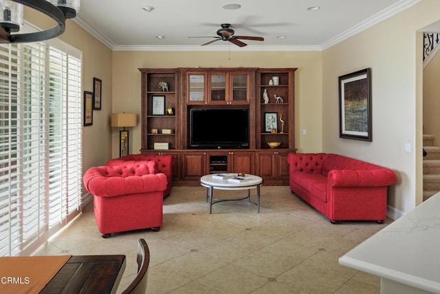 living area featuring baseboards, ceiling fan, ornamental molding, stairs, and light tile patterned flooring