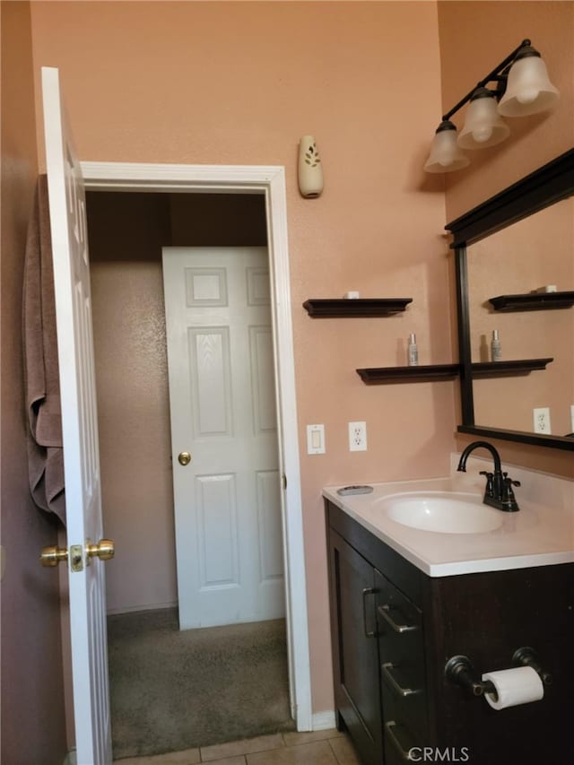 bathroom with vanity and tile patterned flooring