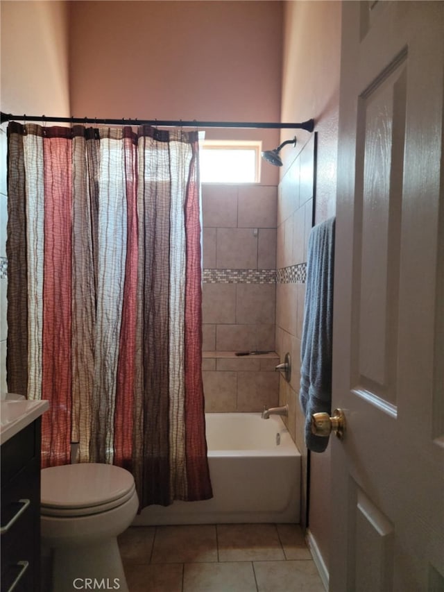 bathroom featuring vanity, toilet, tile patterned flooring, and shower / bathtub combination with curtain