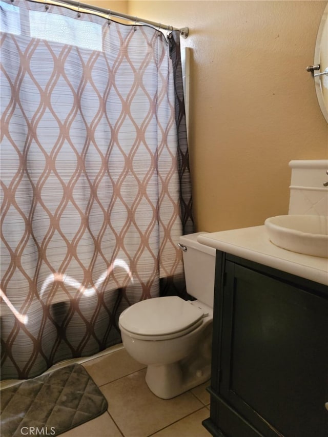 full bath with tile patterned floors, vanity, a shower with shower curtain, and toilet