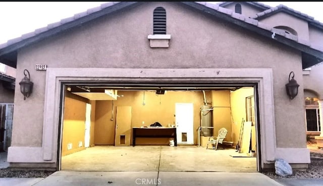 garage with driveway