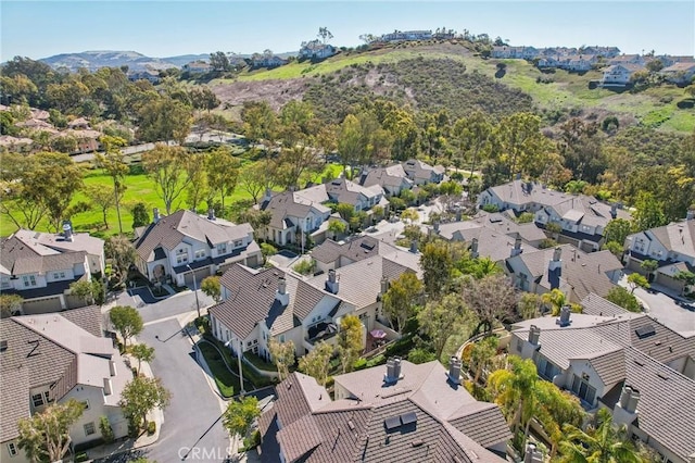 birds eye view of property with a residential view