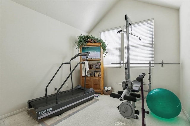 workout area with lofted ceiling, baseboards, and carpet floors