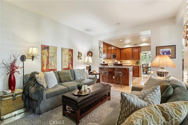 living area with recessed lighting