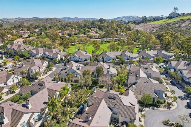 drone / aerial view with a mountain view and a residential view