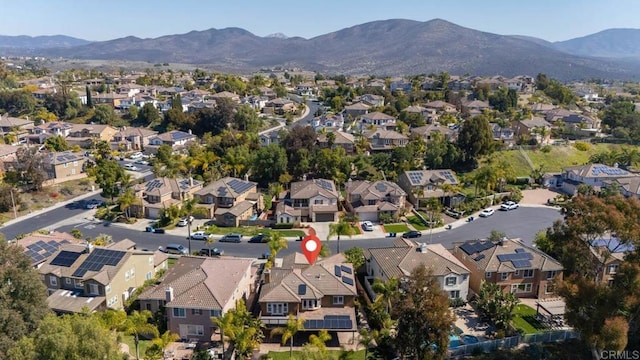 bird's eye view with a mountain view and a residential view