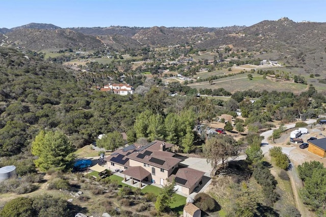 bird's eye view with a mountain view