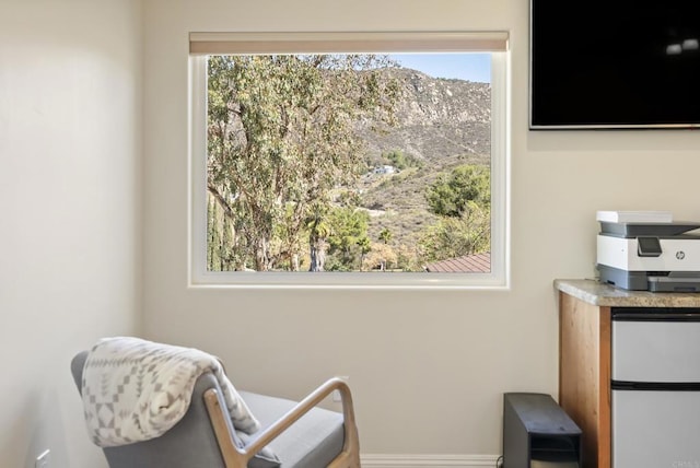 sitting room featuring baseboards