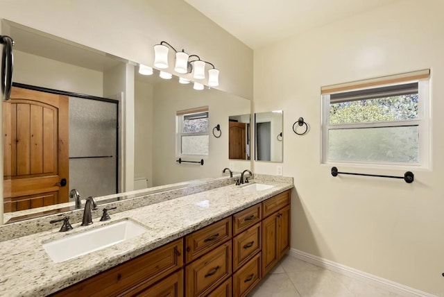 6433 Dehesa Rd, El Cajon, CA 92019 - bathroom with a healthy amount of sunlight, tile patterned flooring, baseboards, and a sink