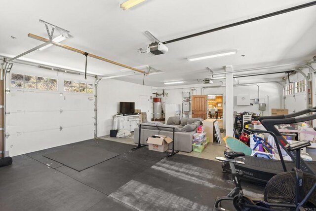 6433 Dehesa Rd, El Cajon, CA 92019 - garage featuring secured water heater and a garage door opener