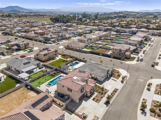 birds eye view of property with a residential view and a mountain view