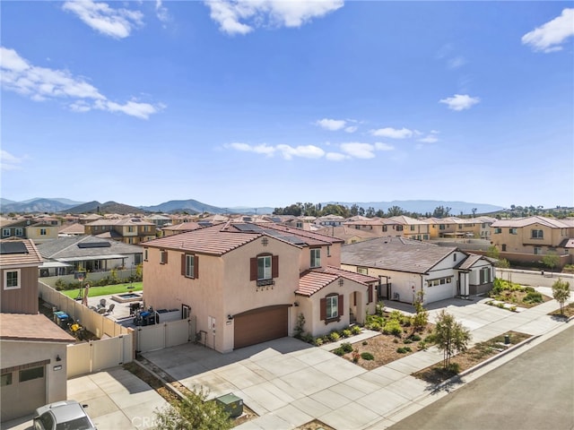 birds eye view of property featuring a residential view and a mountain view