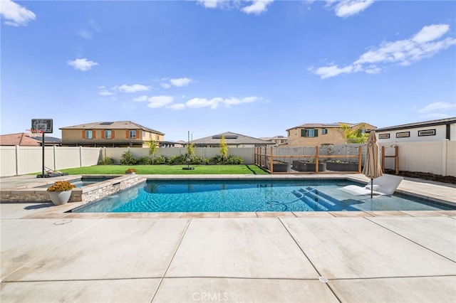 view of pool featuring a patio and a fenced backyard