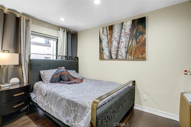 bedroom featuring recessed lighting, baseboards, and wood finished floors