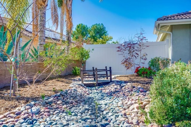 view of patio / terrace featuring fence