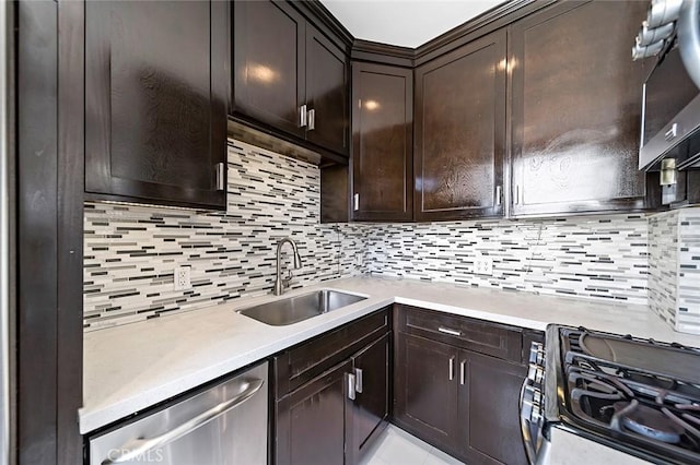 kitchen with dark brown cabinetry, a sink, light countertops, dishwasher, and tasteful backsplash