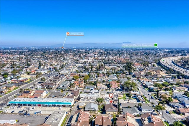 drone / aerial view featuring a mountain view