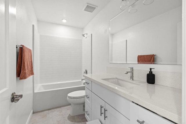 bathroom featuring tile patterned flooring, toilet, vanity, visible vents, and washtub / shower combination