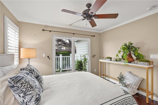 bedroom with wood finished floors, multiple windows, access to exterior, and crown molding