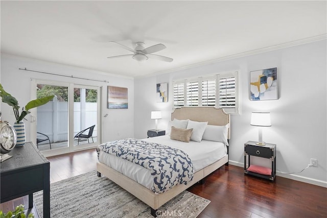 bedroom featuring access to outside, wood finished floors, baseboards, and ornamental molding