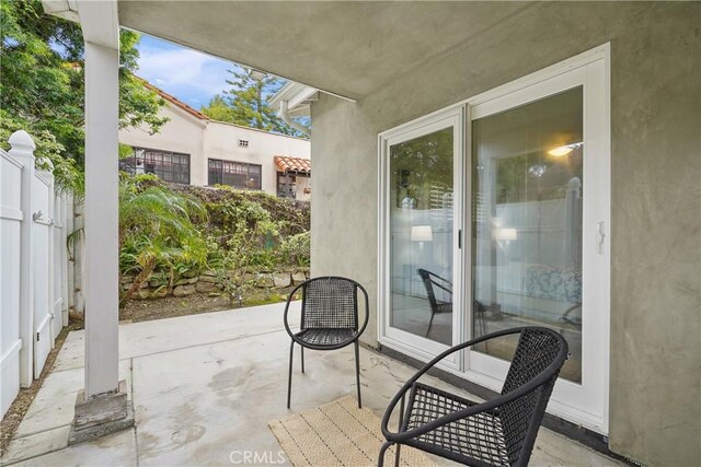 view of patio / terrace with fence